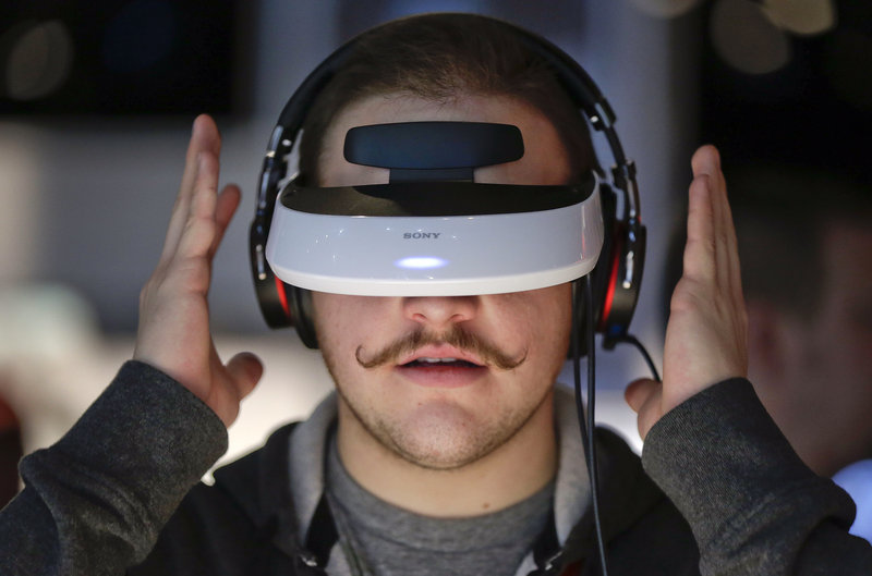 This Sony 3-D personal viewer at the Consumer Electronics Show in Las Vegas is just a high-tech gadget, but may also be seen as a forerunner of much higher-tech automation that replaces jobs now performed by people.
