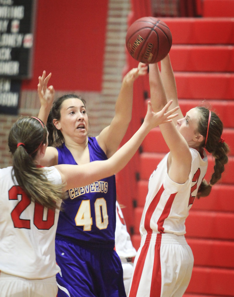 Jessica Willerson of Cheverus defends against South Portland’s Holly Black, right, and Meaghan Doyle.