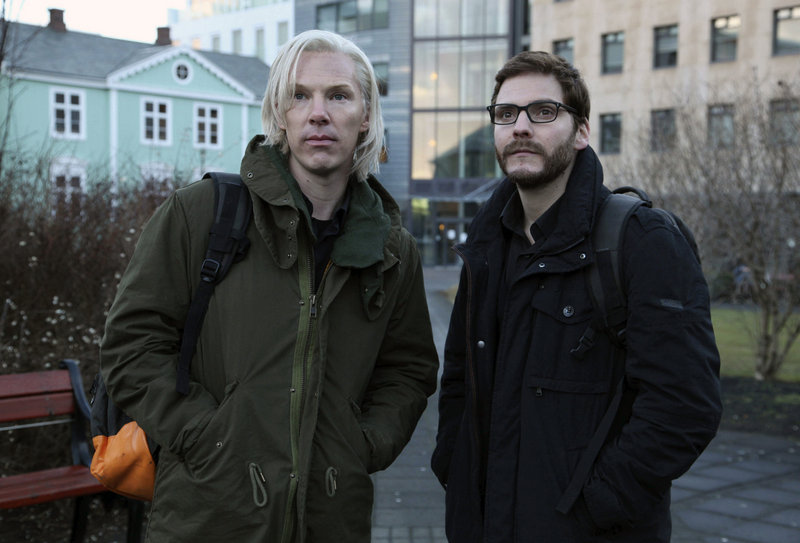 Actors Benedict Cumberbatch as Julian Assange, left, and Daniel Bruhl as Daniel Domscheit-Berg are seen during the production of “The Fifth Estate,” about the WikiLeaks drama.