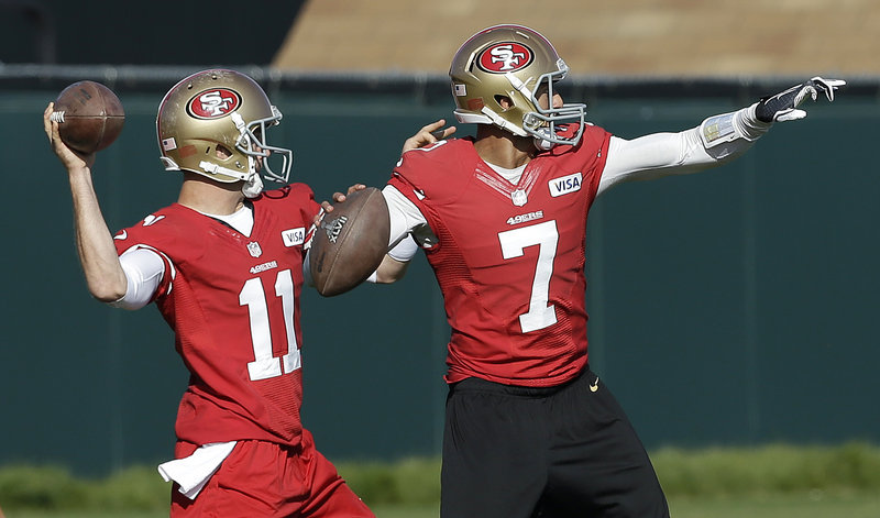 Alex Smith, left, and Colin Kaepernick, the starter, have the arms to test the Baltimore Ravens’ secondary and help provide a championship for the San Francisco 49ers.