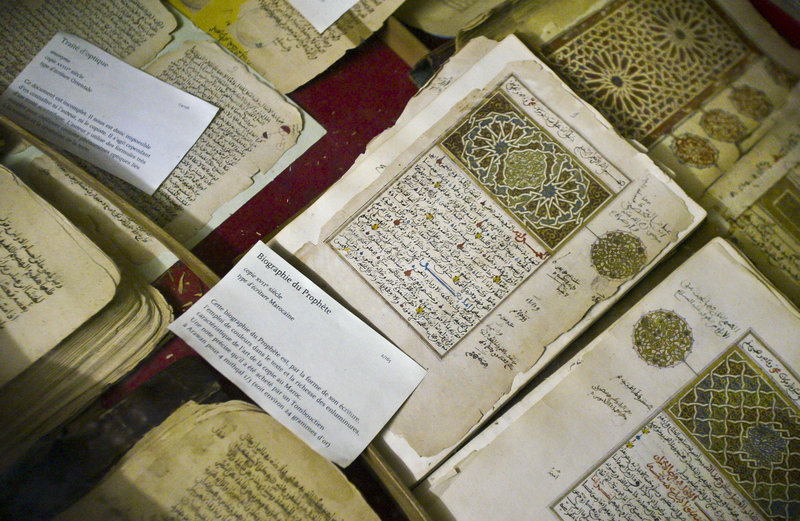 Some of the 20,000 preserved ancient Islamic manuscripts that were displayed at the Ahmed Baba institute in Timbuktu, Mali, are shown. Islamist extremists torched the library containing the manuscripts, the mayor said Monday.