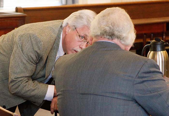 Defendant Mark Strong talks with his attorney Daniel Lilley during a motion hearing at York County Superior Court in Alfred on Thursday.