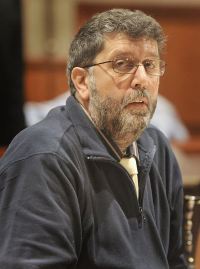 Daniel Tucci appears at his trial in Cumberland County Superior Court in 2013.