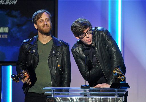 Dan Auerbach, left, and Patrick Carney of the Black Keys accept the award for best rock album "El Camino" at the Grammy Awards. Auerbach also won producer of the year alone and best rock song for "Lonely Boy."