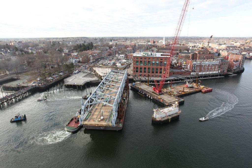 In this January 15, 2013 photo, the 1st section of the new Memorial Bridge is floated out into the Piscataqua River from the Portsmouth waterfront.