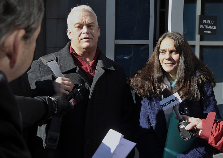 Barry and Paula Spencer talk to the press outside the Cumberland County Courthouse after their trial on charges of providing a place for underaged drinking ended in a deadlocked jury.