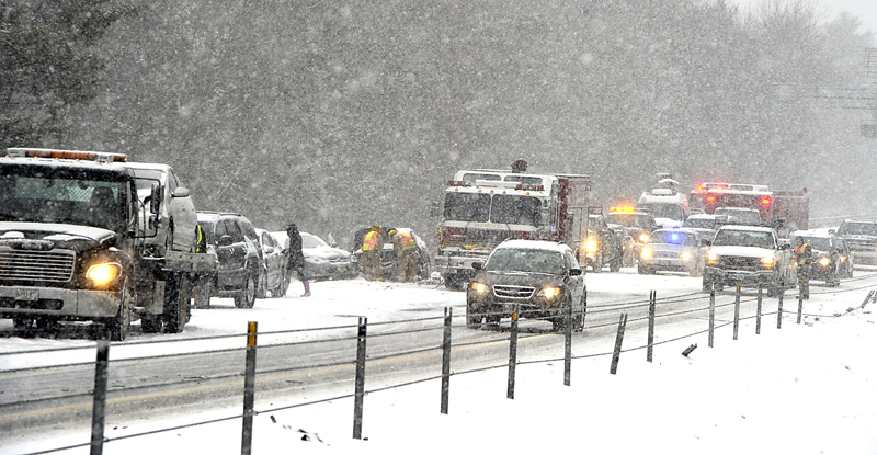 Southbound I-295 between Yarmouth and Falmouth slowed to a crawl Friday morning after a 19-vehicle accident that sent some vehicles off the road and into a deep gully. Several people were sent to the hospital with minor injuries.