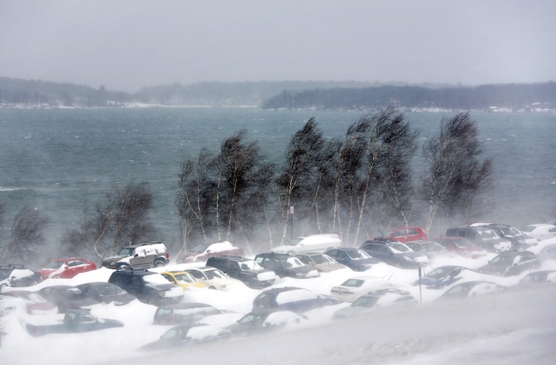 Cars are parked along the Eastern Promenade due to the Portland parking ban during a blizzard in Portland Saturday morning on February 9, 2013.
