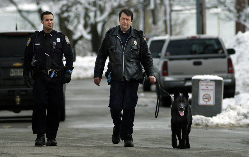 Police officers used bomb sniffing dogs at Southern Maine Community College after the school received a bomb threat early Monday morning, Feb. 25, 2013.