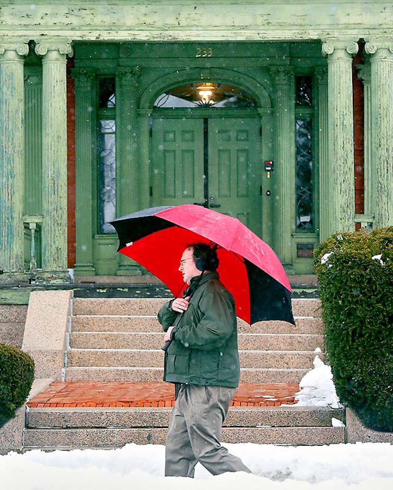 Andrew Scotton of Gorham takes a break from work to take a walk in the sleet on the Western Promenade in Portland on Wednesday, Feb. 27, 2013.
