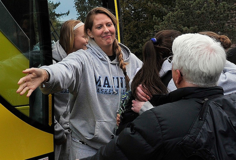The University of Maine women's basketball team returned to Orono on Wednesday evening, Feb. 27, 2013, after being involved in a harrowing crash on I-95 in Massachusetts on Tuesday night.