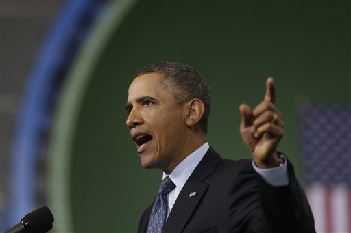 President Barack Obama warns of automatic defense budget cuts during a visit to Newport News Shipbuilding on Tuesday.