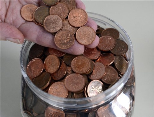 The household penny jar may soon become a thing of the past in Canada. The phasing-out of the penny began Monday at the Royal Canadian Mint.