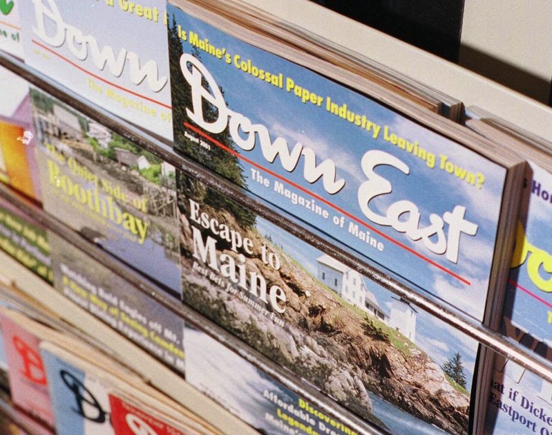 In this August 2001 file photo, editions of Down East Magazine, published in Rockport, Maine. The magazine is bucking the downsizing trend in periodicals and has set new publication highs consecutively over the summer months. (AP Photo/Michael C. York)