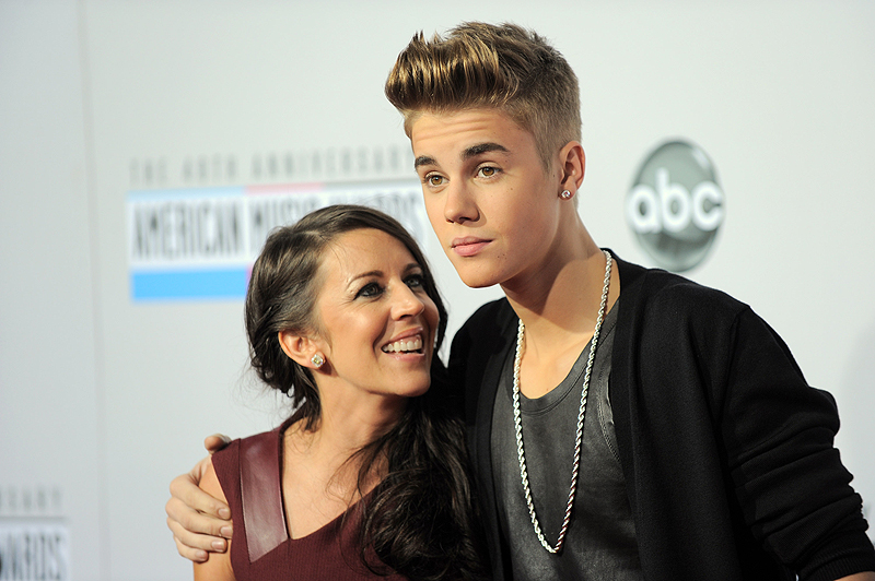 Justin Bieber and his mother, Pattie Mallette, arrive at the 40th Anniversary American Music Awards in Los Angeles last November.