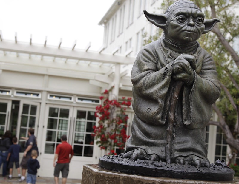 This Aug. 2, 2011 file photo shows a life-sized replica of Yoda, George Lucas' master of the Force, at Lucasfilm Ltd. production studios in San Francisco. Stuart Freeborn, a pioneering movie makeup artist behind creatures such as Yoda and Chewbacca in the "Star Wars" films, has died. He was 98. (AP Photo/Paul Sakuma, File)
