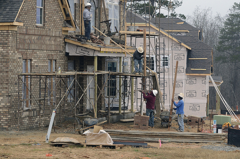 Construction crews build new homes in Waxhaw, N.C. Economists are broadly in agreement that housing is no longer weighing against economic growth and will be a positive contributor in 2013. 04000000 04004003 04004005 2013 FIN krt2013 krtbusiness business krtconstruction construction property krtedonly krtnamer north america krtnational national krtrealestate real estate krtusbusiness krwbureau land price mct REA u.s. us united states