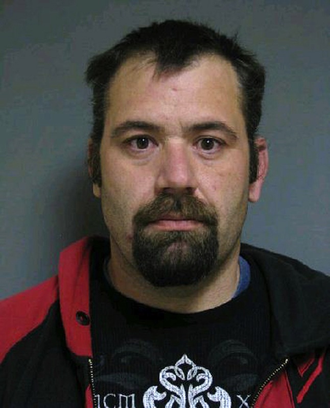 This booking photo released by Vermont State Police shows Ricky Benjamin, 35, of Alburgh, Vt. Authorities said four suspects, including Benjamin, stole items including more than $200,000 in gold coins from a vacant home in Alburgh after its eccentric owner died in a farm accident last year. Benjamin, Shawn Farrell, 41, and Mark Mumley, 52, were arraigned and held on $75,000 bail. A fourth suspect, Jennifer Jarvis, 32, was released after being issued a citation. (AP Photo/Vermont State Police)