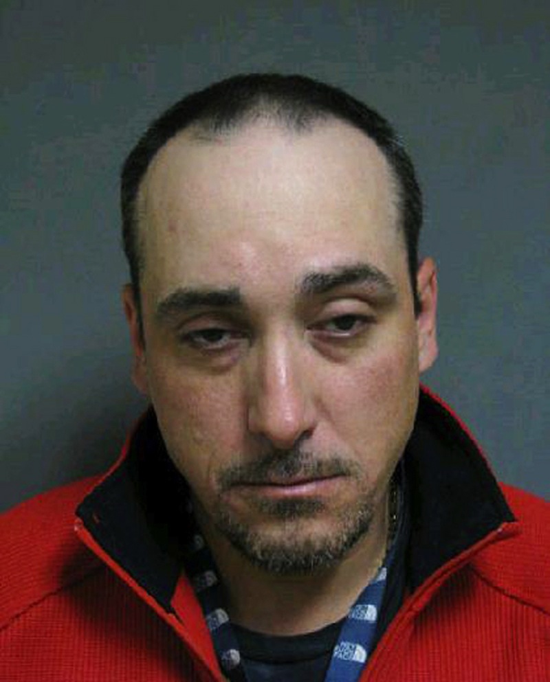 This booking photo released by Vermont State Police shows Shawn Farrell, 41, of Swanton, Vt. Authorities said four suspects, including Farrell, stole items including more than $200,000 in gold coins from a vacant home in Alburgh after its eccentric owner died in a farm accident last year. Farrell, Ricky Benjamin, 35, and Mark Mumley, 52, were arraigned and held on $75,000 bail. A fourth suspect, Jennifer Jarvis, 32, was released after being issued a citation. (AP Photo/Vermont State Police)
