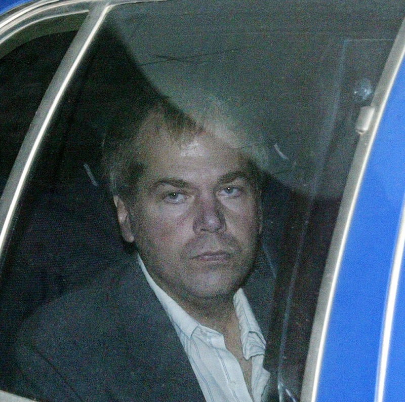In a Nov. 18, 2003 file photo, John Hinckley Jr. arrives at U.S. District Court in Washington. Hinckley, the man who shot President Ronald Reagan is back in court for hearings on whether he should get to spend more time away from the psychiatric hospital where he has been living. (AP Photo/Evan Vucci, File)