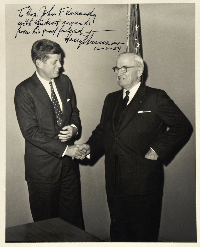 This undated file photo provided by John McInnis Auctioneers shows a photograph of late Presidents John F. Kennedy, left, and Harry Truman, signed by Truman on Dec. 2, 1959. The photograph is part of a collection of John F. Kennedy memorabilia from the family of David Powers, a former special assistant to the president, that fetched almost $2 million at auction Sunday, Feb. 17, 2013 at John McInnis Auctioneers in Amesbury, Mass. (AP Photo/John McInnis Auctioneers, File)