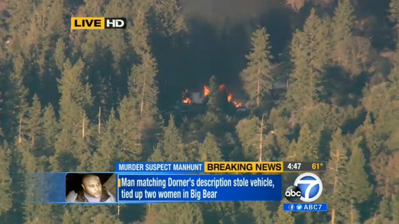 In this image taken from video provided by KABC-TV, the cabin in Big Bear, Calif. where ex-Los Angeles police officer Christopher Dorner died is in flames Tuesday, Feb. 12, 2013. (AP Photo/KABC-TV)