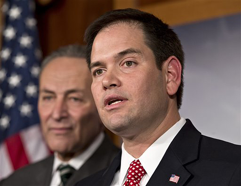 Sen. Marco Rubio, R-Fla., will deliver the Republican response to President Obama's State of the Union address on Tuesday. Behind him is Sen. Charles Schumer, D-N.Y.