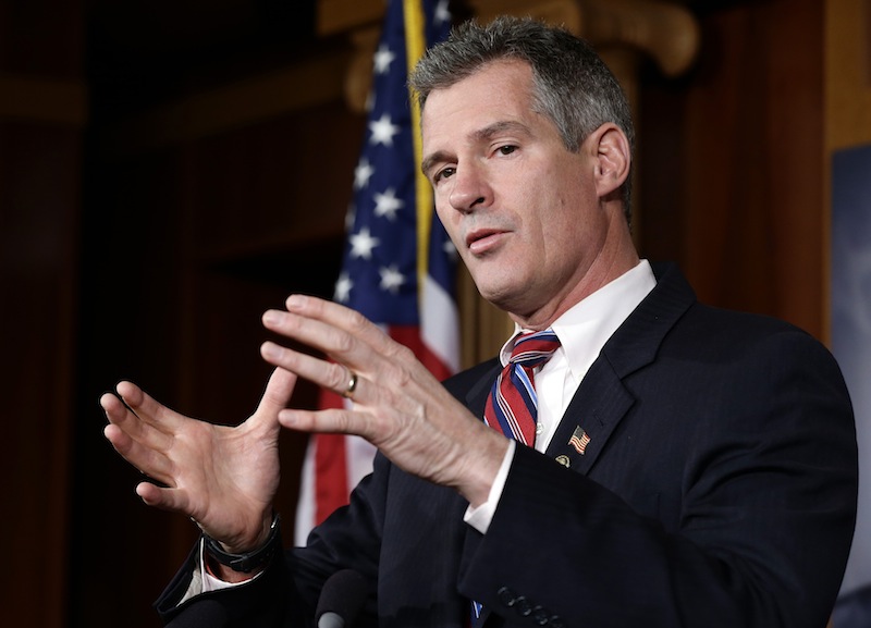 In this Nov. 13, 2012 file photo, Sen. Scott Brown, R-Mass., speaks during a media availability, on Capitol Hill in Washington. Brown, who was defeated in his re-election bid, said Friday, Feb. 1, 2013 that he will not run for the Senate seat vacated by John Kerry, who was named secretary of state. (AP Photo/Alex Brandon)
