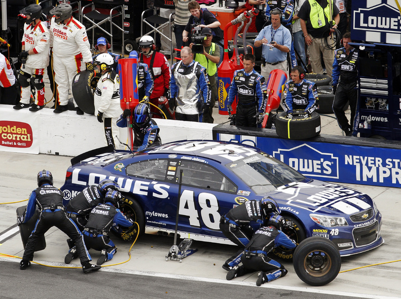 Jimmie Johnson pits for tires and fuel during the NASCAR Daytona 500 Sprint Cup Series auto race at Daytona International Speedway on Sunday in Daytona Beach, Fla.