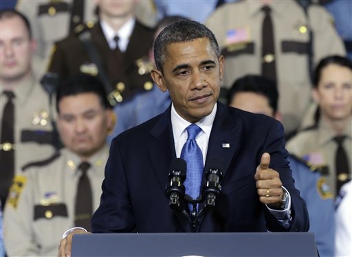 President Barack Obama gestures as he speaks about his gun violence proposals on Monday at the Minneapolis Police Department's Special Operations Center in Minneapolis, where he outlined his plan before law enforcement personnel.