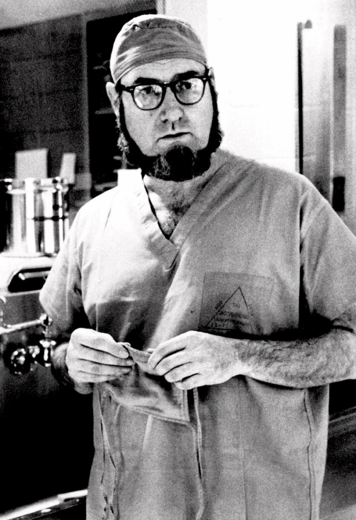 In this Sept. 19, 1974 file photo, Dr. C. Everett Koop, surgeon-in-chief at Children's Hospital in Philadelphia, talks about surgery that separated 13-month-old conjoined twins, Clara and Alta Rodriguez, at the hospital. Koop, who went on to serve as U.S. surgeon general, raised the profile of the office by riveting America's attention on the then-emerging disease known as AIDS and by railing against smoking. Koop died Monday, Feb. 25, 2013, in Hanover, N.H. He was 96. (AP Photo/William G. Ingram, File)