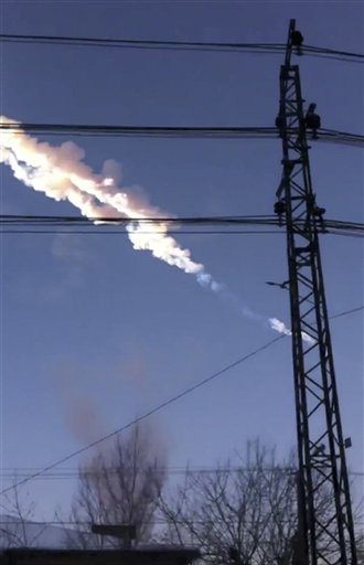 In this photo taken with a mobile phone camera, a meteorite contrail is seen in Chelyabinsk region on Friday.