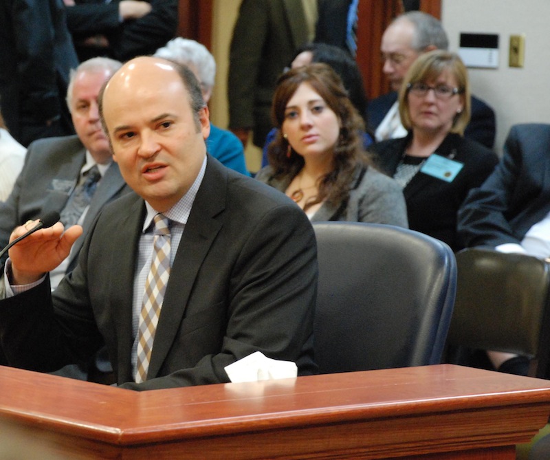 David Hosmer, a Yankton, S.D., lawyer who represents people with mental illnesses, testifies to the South Dakota House Health and Human Services committee on Tuesday, Feb. 19, 2013, in Pierre, S.D., on a bill that would have prevented people involuntarily committed for mental health treatment and declared dangerous to others from having guns. Hosmer supported the bill, but the committee rejected it. (AP Photo/Chet Brokaw)