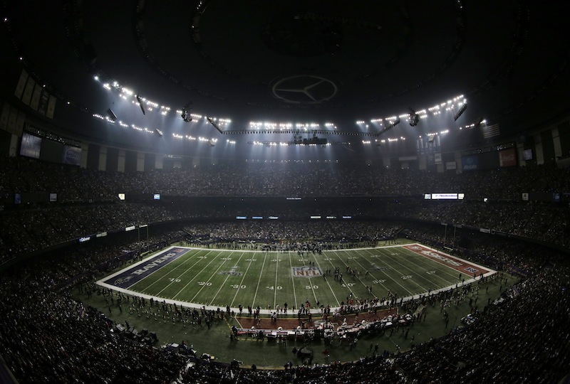 Fans and members of the Baltimore Ravens and San Francisco 49ers wait for power to return in the Superdome during an outage in the second half of the NFL Super Bowl XLVII football game, Sunday, Feb. 3, 2013, in New Orleans. (AP Photo/Charlie Riedel) bowl lights out, outage, power power, super Super Bowl MVP