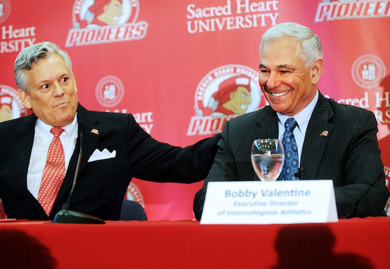 Senior Vice President of Athletics and Student Affairs James Barquinero, left, introduces Bobby Valentine during news conference at Sacred Heart University in Fairfield, Conn., Tuesday, Feb. 26, 2013. Valentine has been named executive director of Intercollegiate Athletics at Sacred Heart. (AP Photo/The Connecticut Post, Brian A. Pounds) Brian A. Pounds;pounds;connecticut post;connpost.com