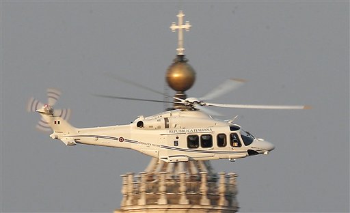 A helicopter with Pope Benedict XVI onboard leaves the Vatican in Rome on Thursday.