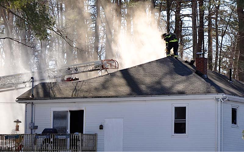Firefighters from Portland put out a blaze in North Deering on Sunday afternoon. A woman in her 50s was badly burned and taken to the hospital.