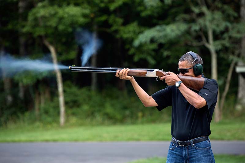 President Obama shoots clay targets on the range at Camp David, Md., on Aug. 4, 2012, in this photo released by the White House on Saturday, two days before the president heads to Minnesota to talk about gun-control initiatives.