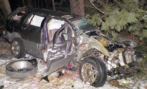 Police said this 2003 Mercury Mountaineer rolled over and crashed into trees early Wednesday morning in Vienna, killing the driver, Hilda Howe, 36, of Farmington Falls.