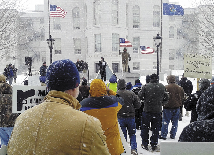 Rep. Deborah Sanderson, R-Chelsea, speaks to at a gun rally outside the State House on Friday.