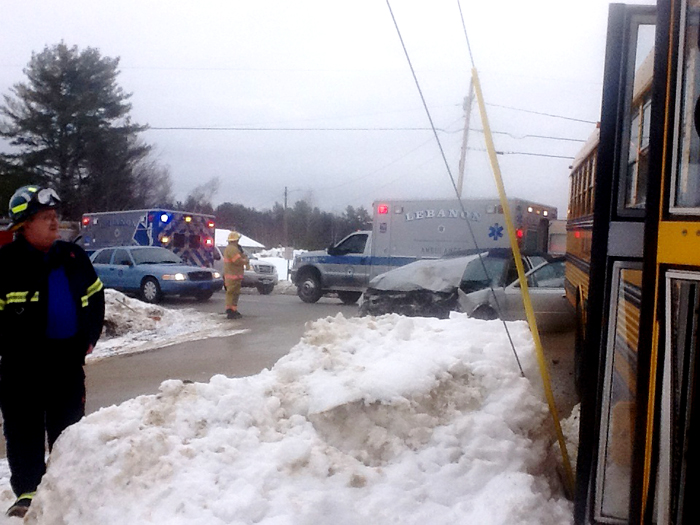 The crash scene Tuesday morning in Lebanon. The bus, shown at right, was reportedly coming off of Lower Middle Road when it collided with a car traveling westbound on Route 202. Photo provided by Lebanon Rescue Department.