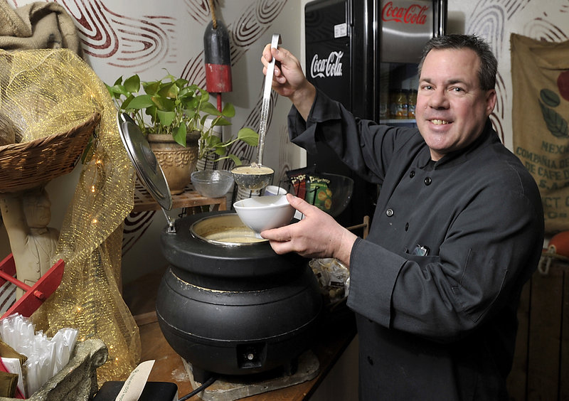 Owner Karl Whipple fills a bowl with his very popular portabella mushroom soup for a customer at Whip’s Right Time Cafe.