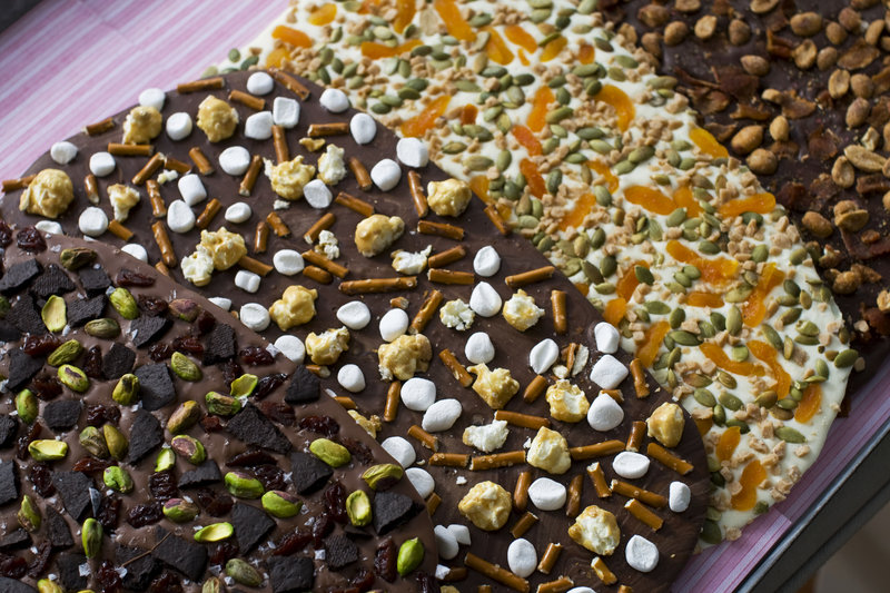 Four variations of Valentine’s Day chocolate bark. You can top the chocolate with whatever your love loves.