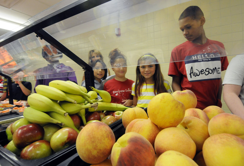 Under new rules proposed Friday by the USDA, most snacks sold in schools would have to have less than 200 calories. The rules also would set fat, sodium, calorie and sugar limits on almost all foods sold in schools.