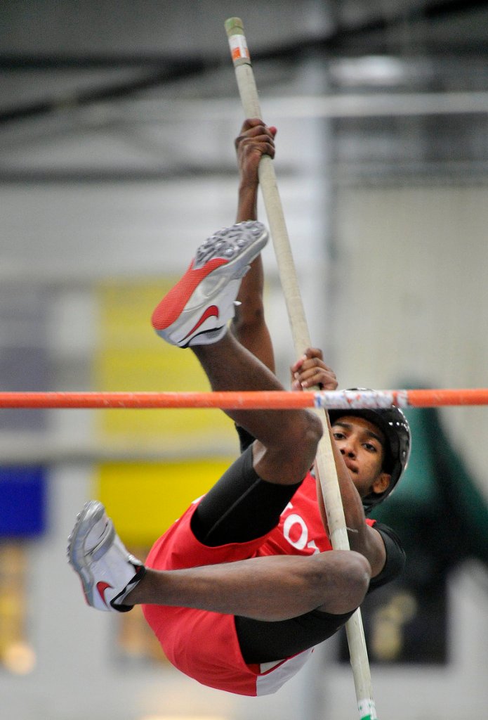 Michael Cuesta of South Portland keeps his focus Saturday in the pole vault in the Southwestern indoor track meet at Gorham. The Scarborough boys and Thornton Academy girls triumphed.