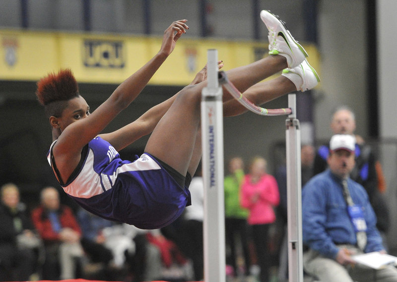 Rashad Zagon of Deering keeps her eyes on the bar, hoping it stays put Saturday while competing in the girls’ high jump at the Southwesterns in Gorham. Zagon finished third in 4 feet, 10 inches. The Scarborough boys and Thornton Academy girls took team titles.
