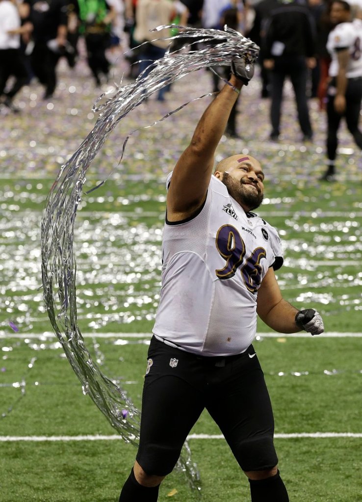 Ravens nose tackle Ma’ake Kemoeatu celebrates after Baltimore won its first Super Bowl title since the 2000 season.