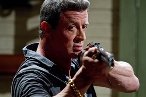 Sylvester Stallone brandishes a gun in “Bullet to the Head,” a movie reviewed in the Jan. 31 edition of GO. Several photos in the Jan. 31 GO portray actors wielding guns, notes a reader who believes that violent entertainment desensitizes people to real-life shootings.