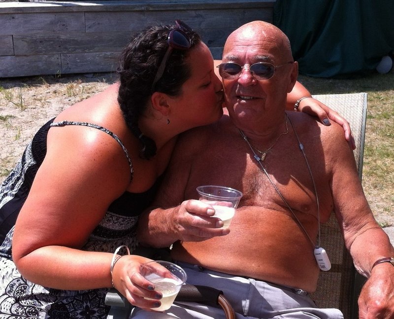 Roland Bouthillette with his granddaughter Emma at the beach in July 2012.