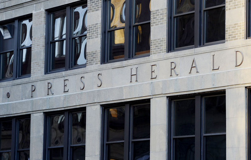 The sign on the old Portland Press Herald building at 390 Congress St. in Portland on Thursday, February 7, 2013.
